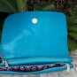 custom curving leather clutch