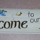 welcome to our home with purple & blue flowers