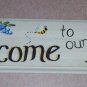 welcome to our home with purple & blue flowers