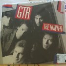 artist: GTR title: The Hunter label: Arista year: 1986' Used 12" Vinyl Record (Promo) artist: GTR title: The Hunter label: Arista year: 1986' Used 12" Vinyl Record (Promo)