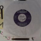 artiste: Skitch Henderson side A: Two Cigarettes In The Night / B: Moonglow (Used) 7"