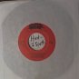 artiste: John Wheaton side A: Musicians Blues / B: Auctioneer Song (Used) 7"