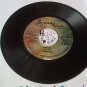 artiste: Sizzla side A: Defend It / Versatile side B: Nuff Gal (Used) 7"