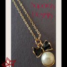 Black Bow Design Necklace With White Faux Pearl & Gold Tone Finish