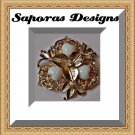 Gold Tone Flower Design Brooch With White Heart Design Beads