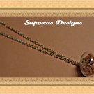 Gold Tone Glass Ball Design Necklace With Orange Stars