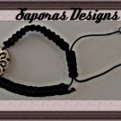 Handwoven Black Braided Bracelet With Silver Tone Flower Charm Adjustable To Fit