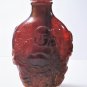 Vintage Chinese Carved Cherry Amber Buddha and Boys Snuff Bottle