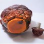 Vintage Chinese Carved Cherry Amber Buddha and Boys Snuff Bottle