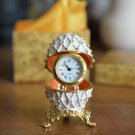 A copy of the Faberge Egg with a quartz watch Russian Souvenir Gift Handmade