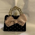 Black purse Christmas ornament. NWT