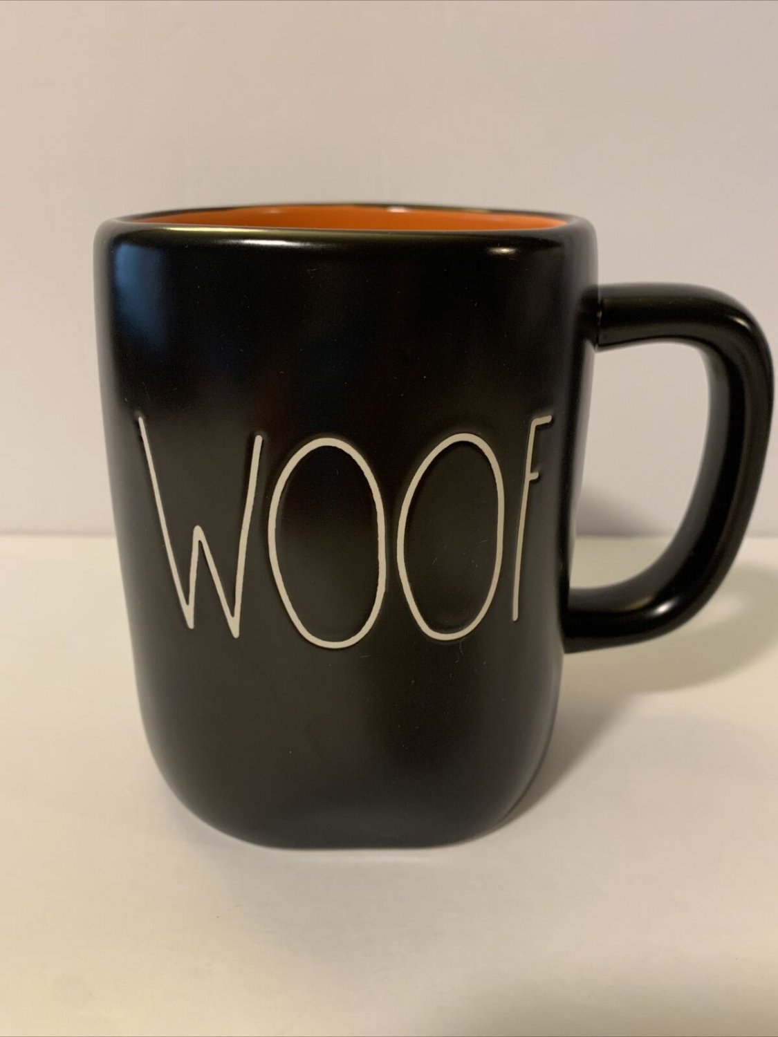 Rae Dunn "Woof" Mug.  Halloween.  Black with Orange interior.  HTF.