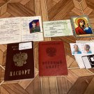 A trophy set of documents, a passport, and a military ID from the Russian occupier. War in Ukraine. A trophy set of documents, a passport, and a military ID from the Russian occupier. War in Ukraine.