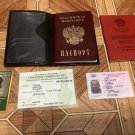 A trophy set of documents, a passport, and a military ID from the Russian occupier. War in Ukraine. A trophy set of documents, a passport, and a military ID from the Russian occupier. War in Ukraine.
