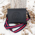 Embossed shoulder bag clutch