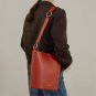 Buckle bag with wide shoulder strap