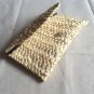 Hand-woven clutch