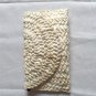 Hand-woven clutch