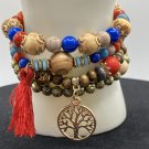 Bracelets 4 Pc. Stretch Bracelets Layered Beaded with Tassel and Charm #493 Bracelets 4 Pc. Stretch Bracelets Layered Beaded with Tassel and Charm #493