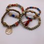 Bracelets 4 Pc. Stretch Bracelets Layered Beaded with Tassel and Charm #493