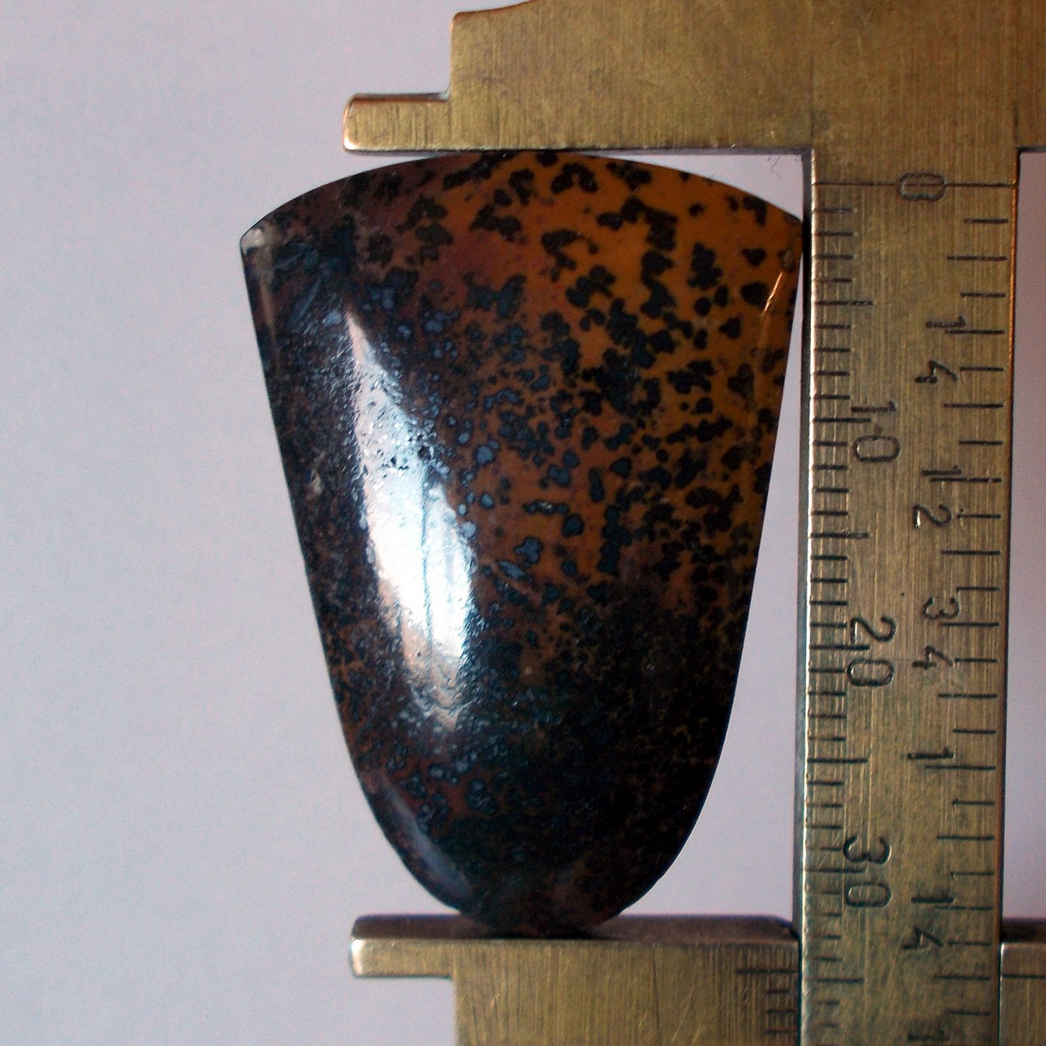 Jasper with psilomelane dendrites, 34.5X24.5mm tongue