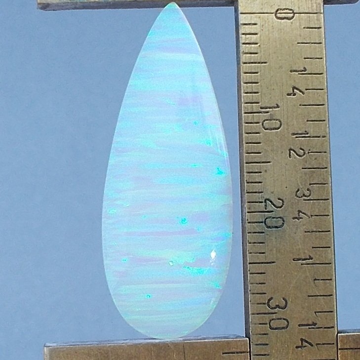White lab created opal cabochon, 33.7X13.1mm drop