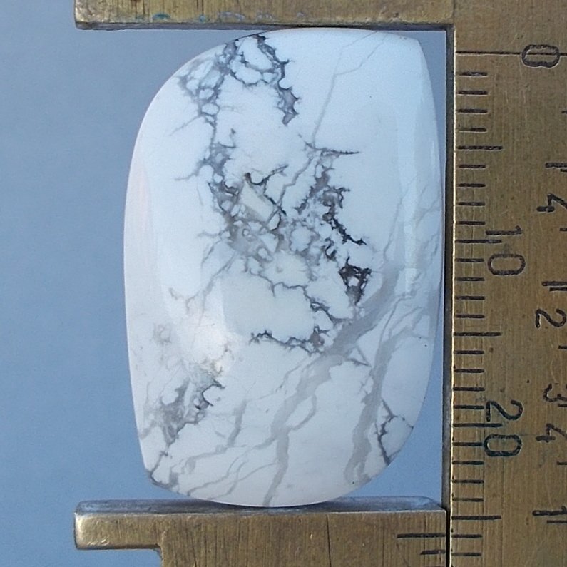 Howlite cabochon, 25.9X17.3mm freeform