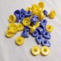 Round and teardrop plastic game pieces 20 yellow 19 purple