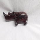 Carved stone African rhinoceros figurine