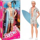 Barbie the Movie Ken Doll Wearing Pastel Pink and Green Striped Beach Matching S