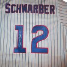 Kyle Schwarber Autographed Chicago Cubs Jersey W/PROOF, Picture of Kyle Signing