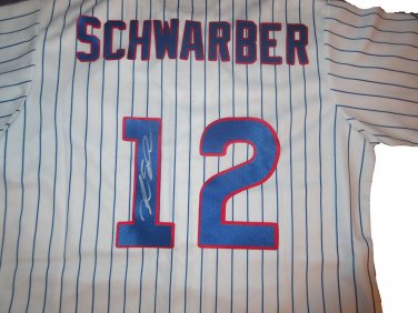 Kyle Schwarber Autographed Chicago Cubs Jersey W/PROOF, Picture of Kyle Signing