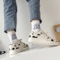 Ladies Vulcanized Cow Print Platform Sneakers