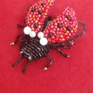Handmade beaded brooch "Ladybug"