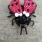 Handmade beaded brooch "Ladybug"
