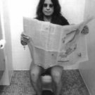 Ozzy Osbourne Reading Newspaper in the toilet Poster 13x19 inches