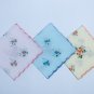 A set of three handmade womenâ��s handkerchiefs. 100% cotton. Random colour. 28cm*28cm.