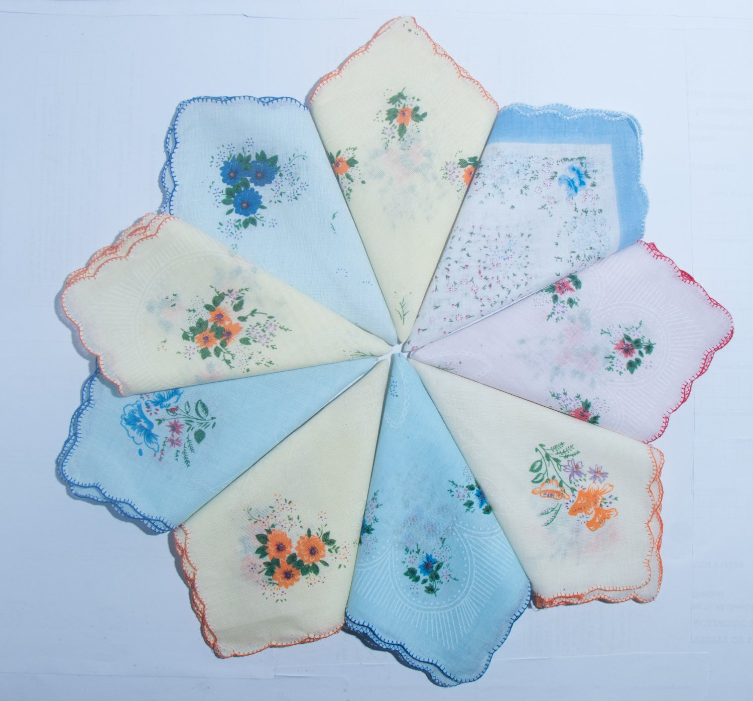 A set of three handmade womenâs handkerchiefs. 100% cotton. Random colour. 28cm*28cm.