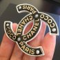 COCO CHANEL PARIS CC Fashion Brooch Pin ACRYLIC BLACK White Gold NIB