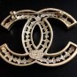 CHANEL Pale Gold Hollow Patterned Metal Brooch Pin Vintage Style