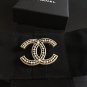 CHANEL Pale Gold Hollow Patterned Metal Brooch Pin Vintage Style