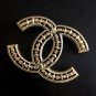 CHANEL Pale Gold Hollow Patterned Metal Brooch Pin Vintage Style