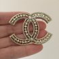 CHANEL Pale Gold Hollow Patterned Metal Brooch Pin Vintage Style
