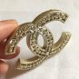 CHANEL Pale Gold Hollow Patterned Metal Brooch Pin Vintage Style