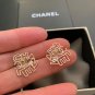 CHANEL Stud Earrings Pale Gold Metal Alphabets Hallmark Authentic