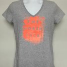 Womens The North face V Neck t shirt medium classic fit orange paint ball logo