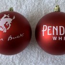 2 New Pendleton Whisky Let 'er Buck Red Plastic Ornaments White logo 3"