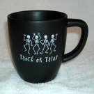 Rae Dunn by Magenta Trick or Treat ceramic coffee mug 16 oz skeletons black