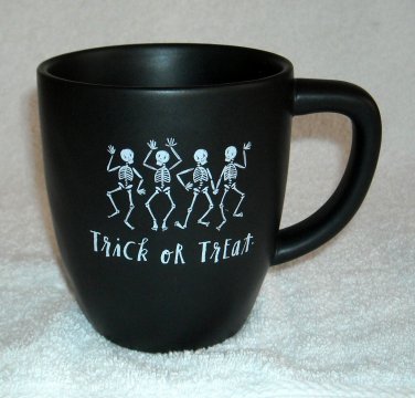 Rae Dunn by Magenta Trick or Treat ceramic coffee mug 16 oz skeletons black