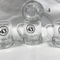 4 New Licor 43 Mini Mug Shot Glasses Embossed Base